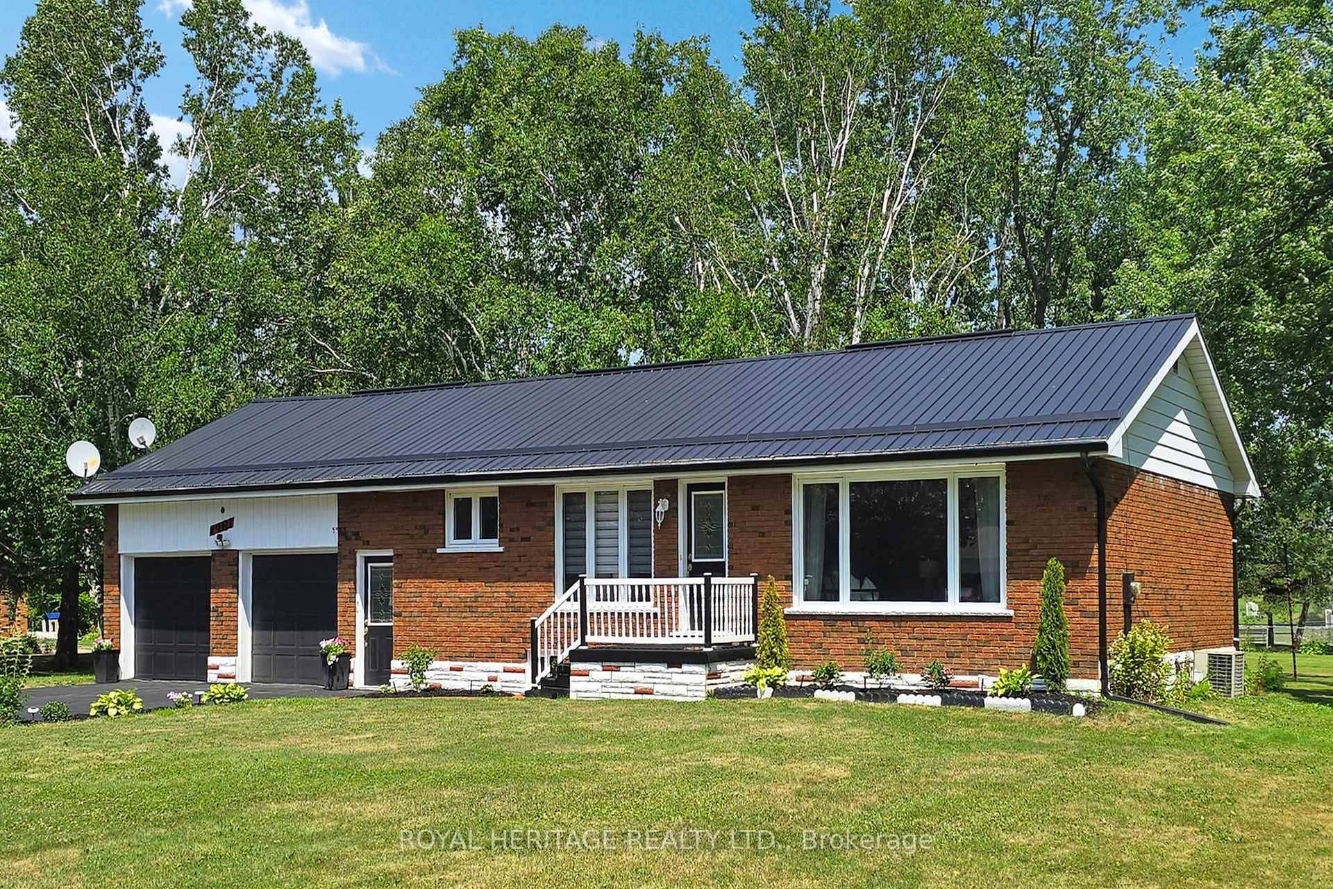 First time on the market, an impeccably maintained all brick bungalow on just over an acre !