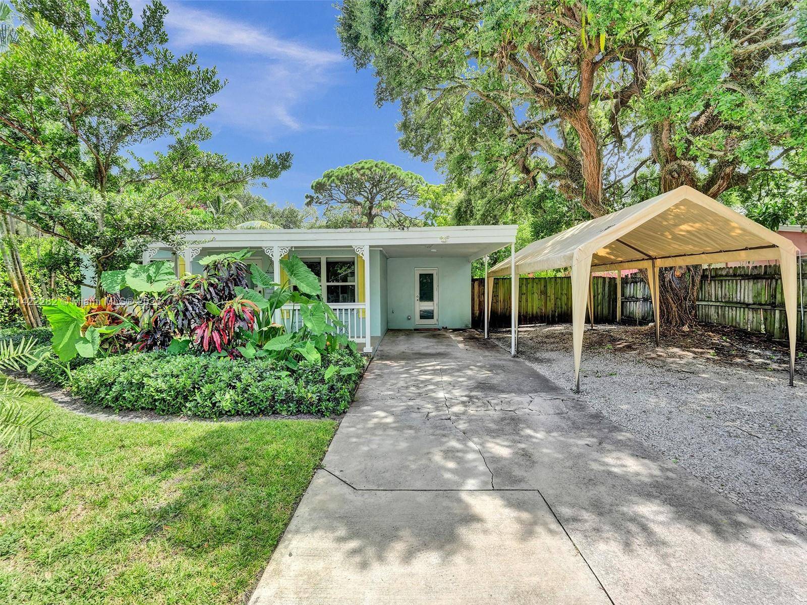 Furnished beach vibe, tropical oasis cottage style 2 1 home situated on a fenced just under 1 4 acre lot, mins from downtown Ft Laud the beaches.