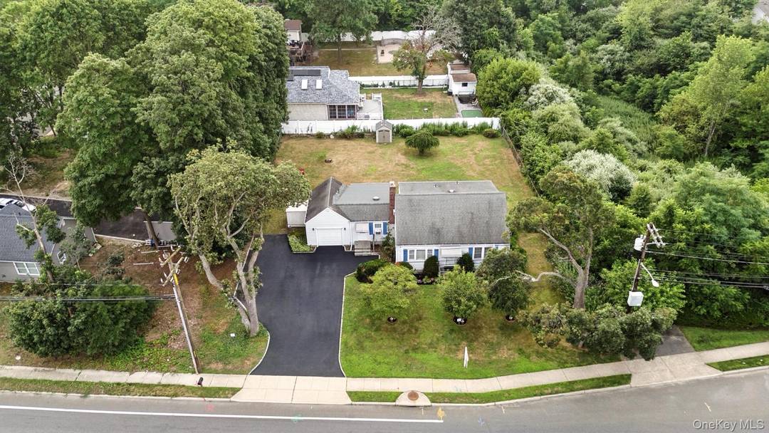 A rare opportunity awaits in the prestigious Half Hollow Hills East School District with this oversized 100 x 140 lot approximately one third acre.