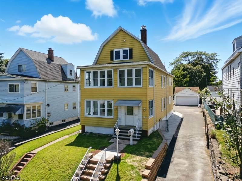 Welcome to this beautifully renovated two family home in the heart of West Orange !