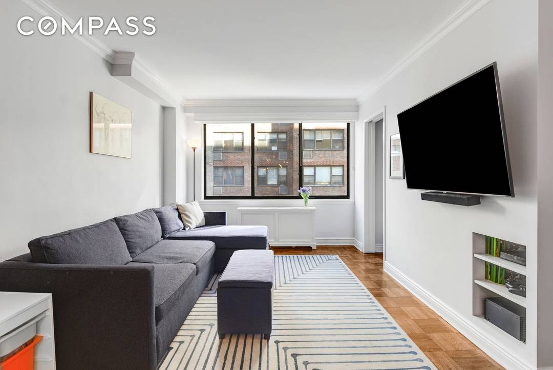 Welcome to Residence 7J at 345 East 73rd Street, where spacious elegance meets modern convenience.