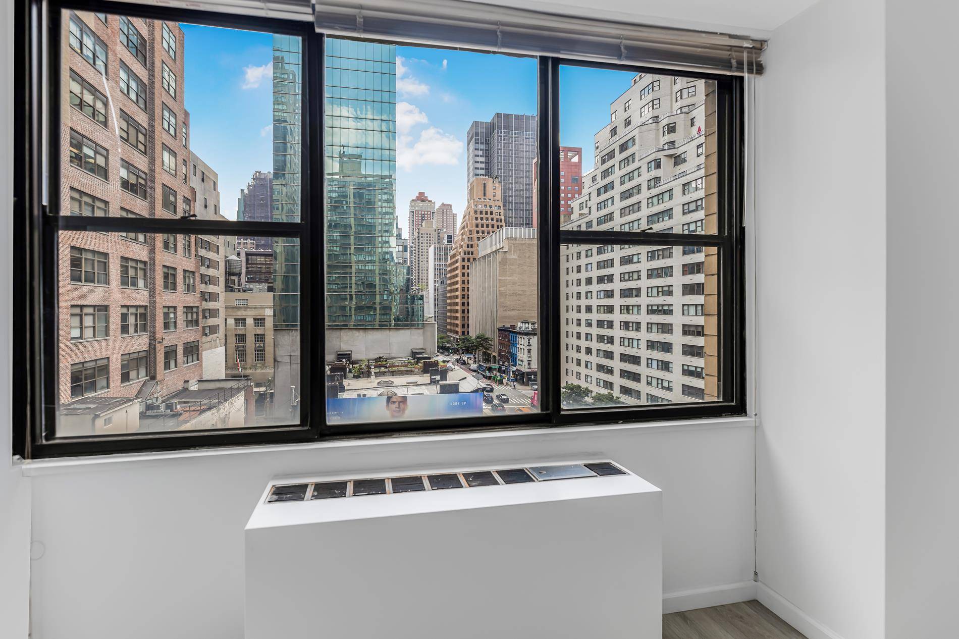 One bedroom, New floors, facing south with open city view, large windows in living and bedroom.