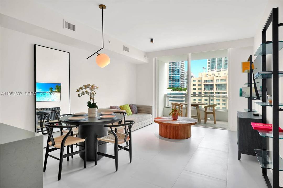 Exceptional turnkey 1 bedroom den residence at The Bond, one of Brickell s most sought after addresses.
