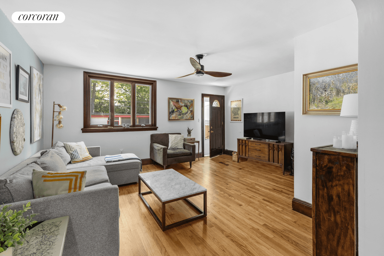 Welcome home to 21 E 4th Street a three story two family Townhouse, thoughtfully designed for flexible living, complete with an extra wide driveway and nestled on a serene tree ...