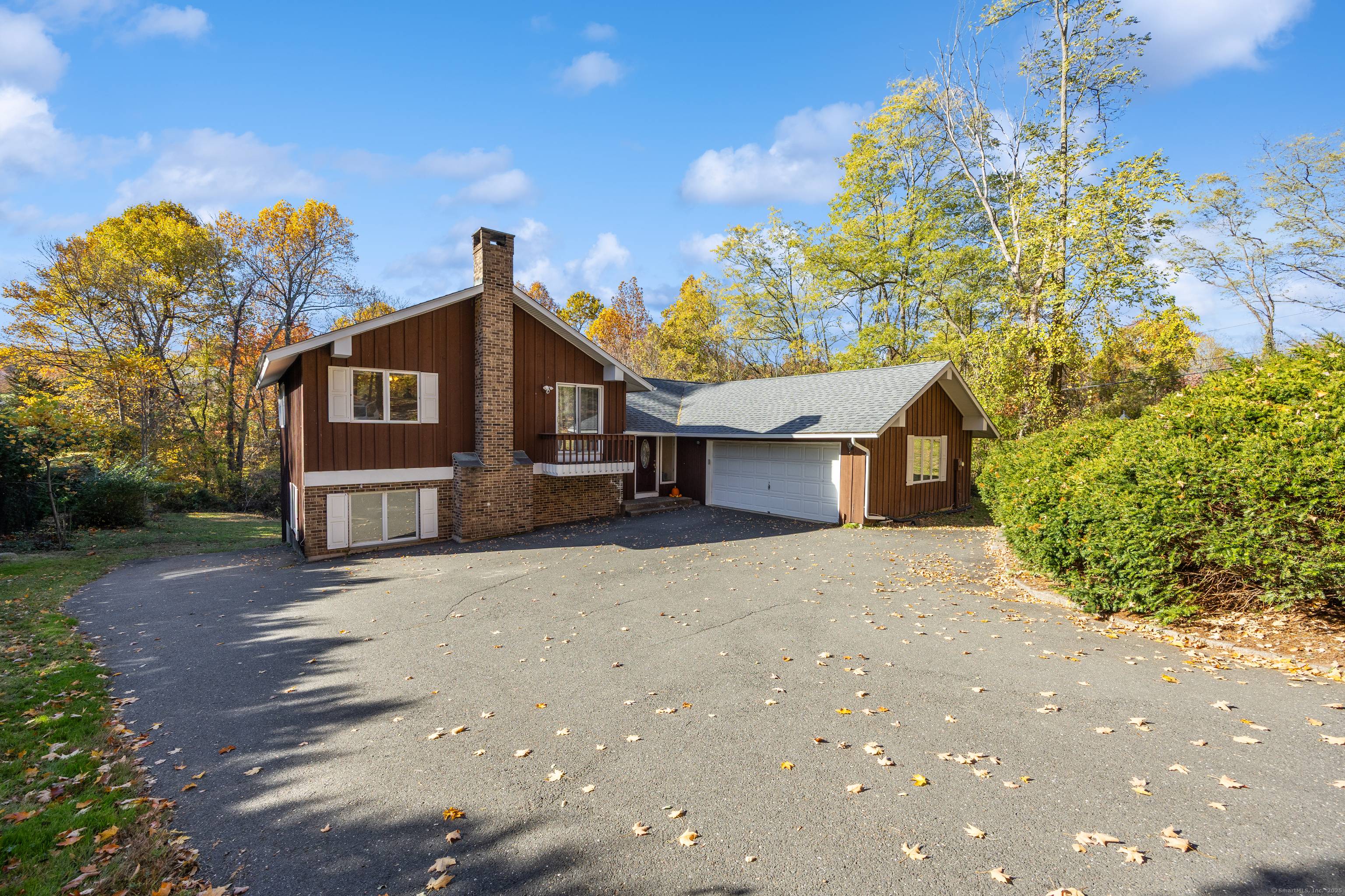 Step into this spacious 4 bedroom, 3 full and 2 half bath split level contemporary home offering over 2, 000 square feet of modern living space.