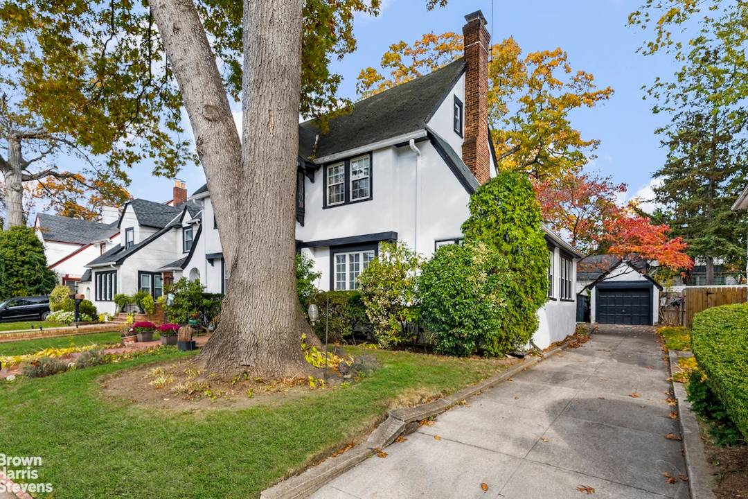 Landmarked Tudor style home for sale in Addisleigh Park, one of Queens' most historic and architecturally rich neighborhoods.