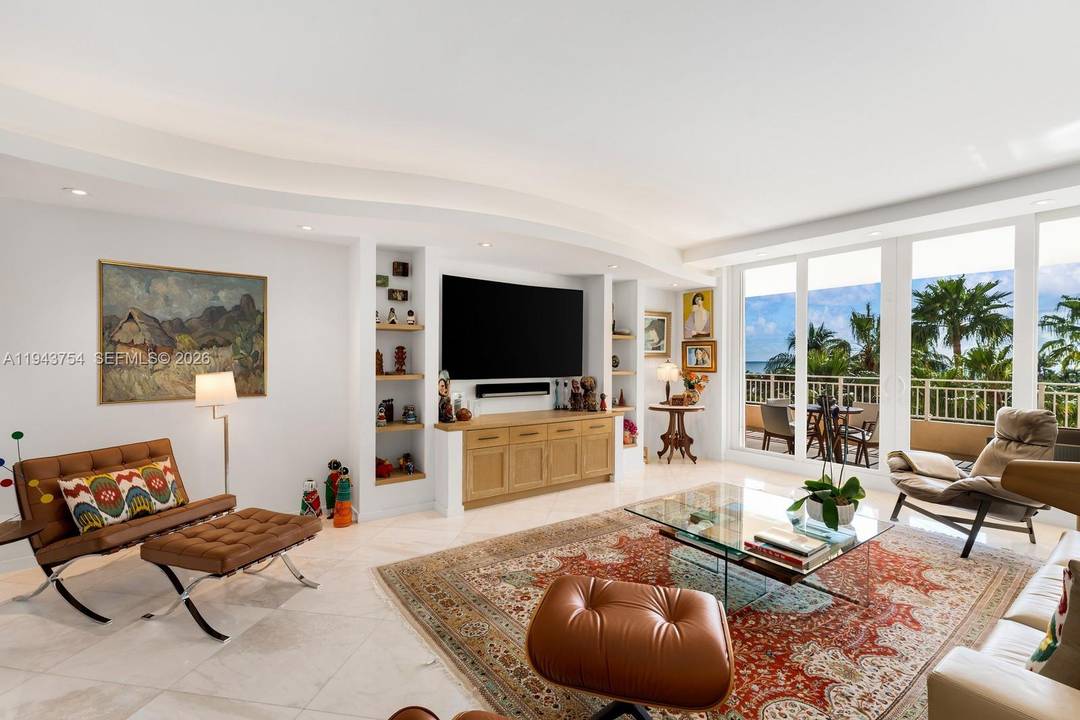 Unique opportunity to own a custom designed and remodeled 2, 605 SF residence in The Ocean Club s most desirable beachfront building, Ocean Tower Two.