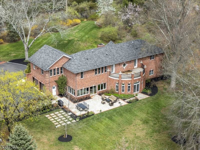 Prepare to FALL IN LOVE with this one of a kind Custom brick home on 3 level Acres, with low taxes, blue ribbon schools beautifully designed with architectural features of ...