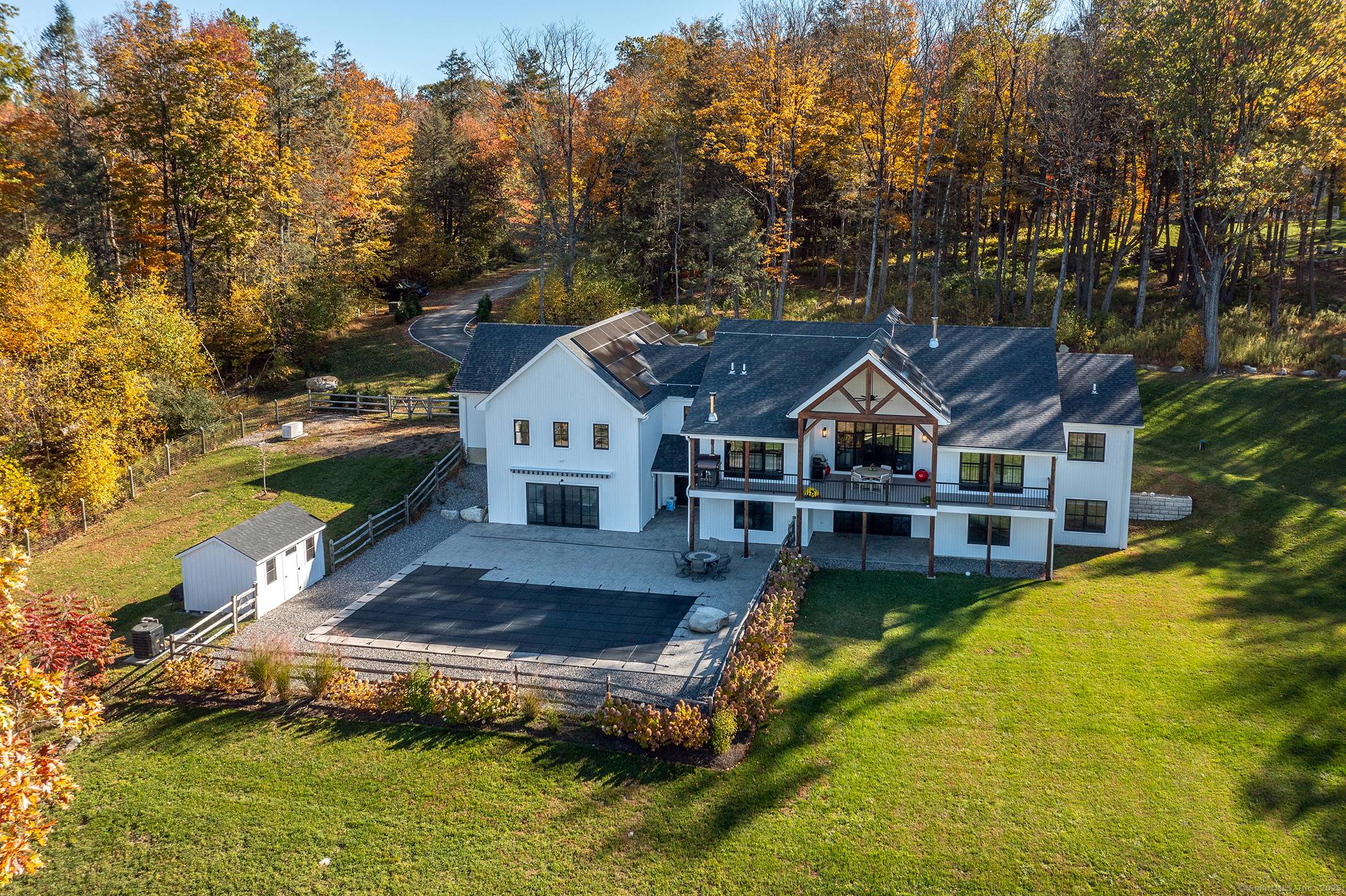 Your Ultimate Winter Retreat Embrace the magic of a Connecticut winter at this impeccably designer furnished seasonal escape in the heart of Litchfield County's premier winter playground.