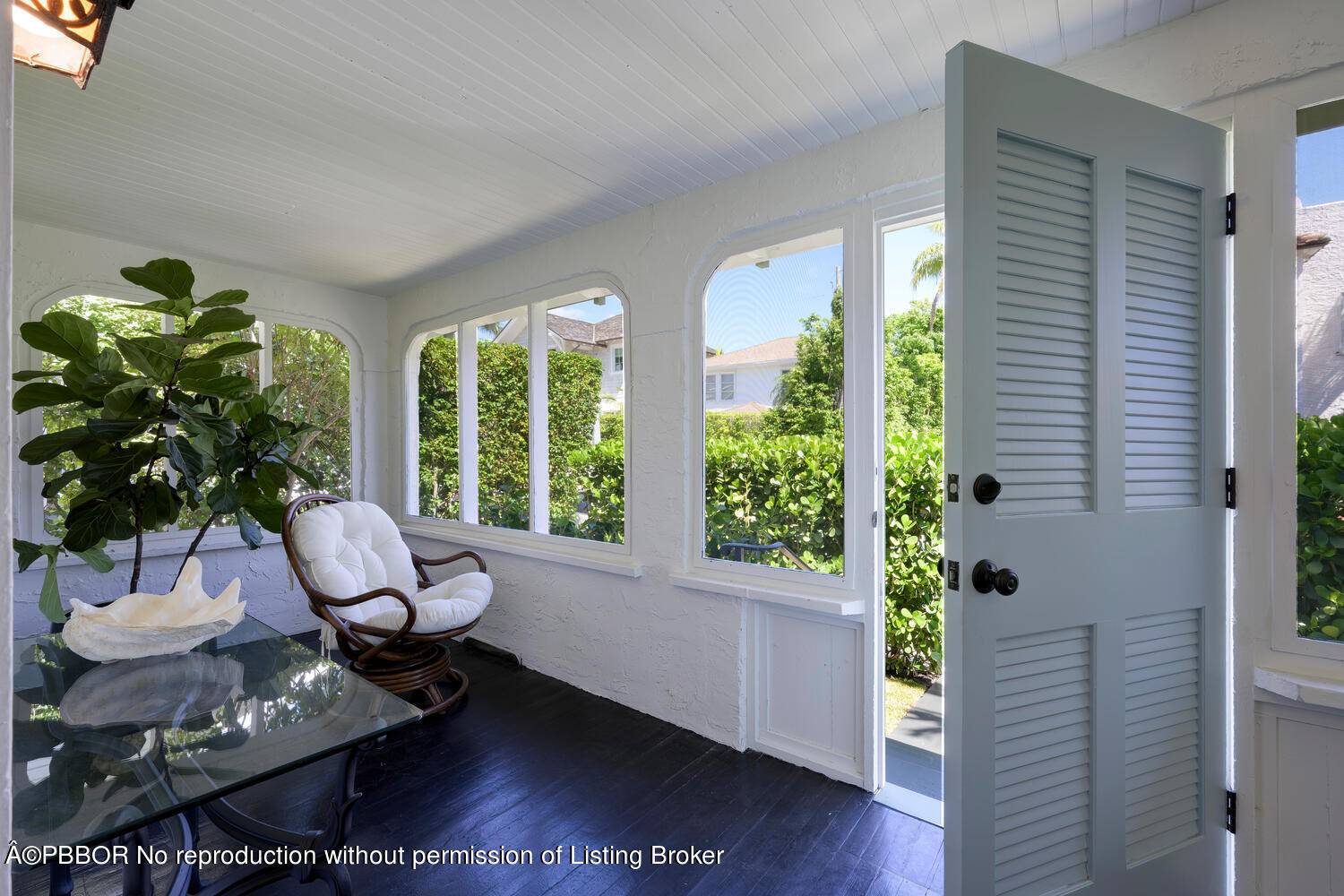 Charming 1920s Palm Beach Island cottage with gorgeous Dade County Pine floors and remarkable volume throughout.