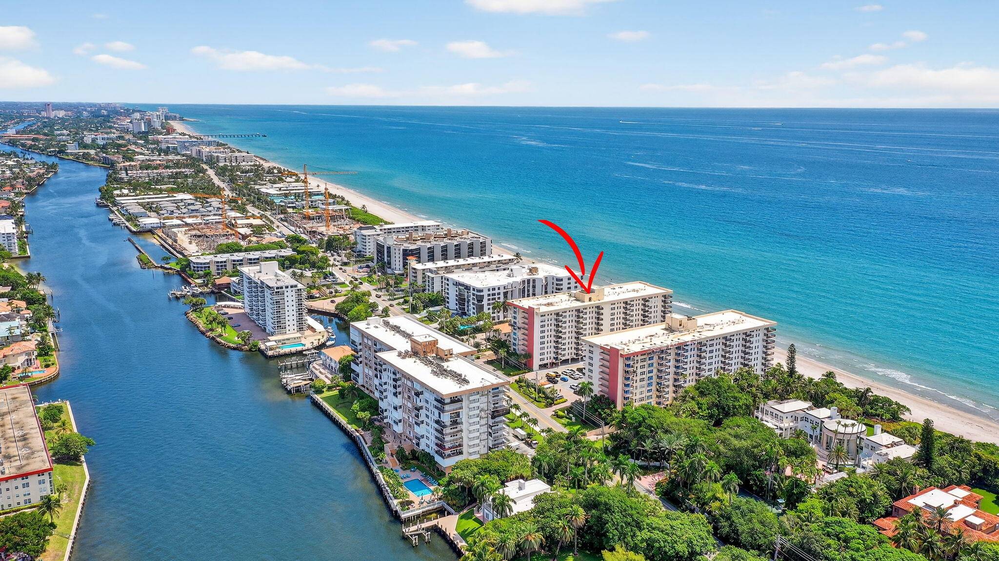 Experience oceanfront living on prestigious Hillsboro Mile !