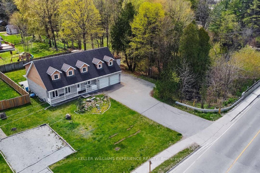 This unique family home is set on a rare, expansive in town property beside the picturesque Nottawasaga River, offering the perfect blend of space, comfort, and natural beauty.