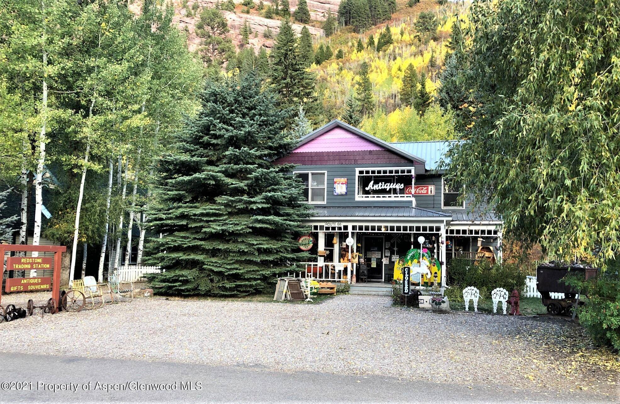 Combined three bedroom, two and a half bath home and retail business on the Boulevard.