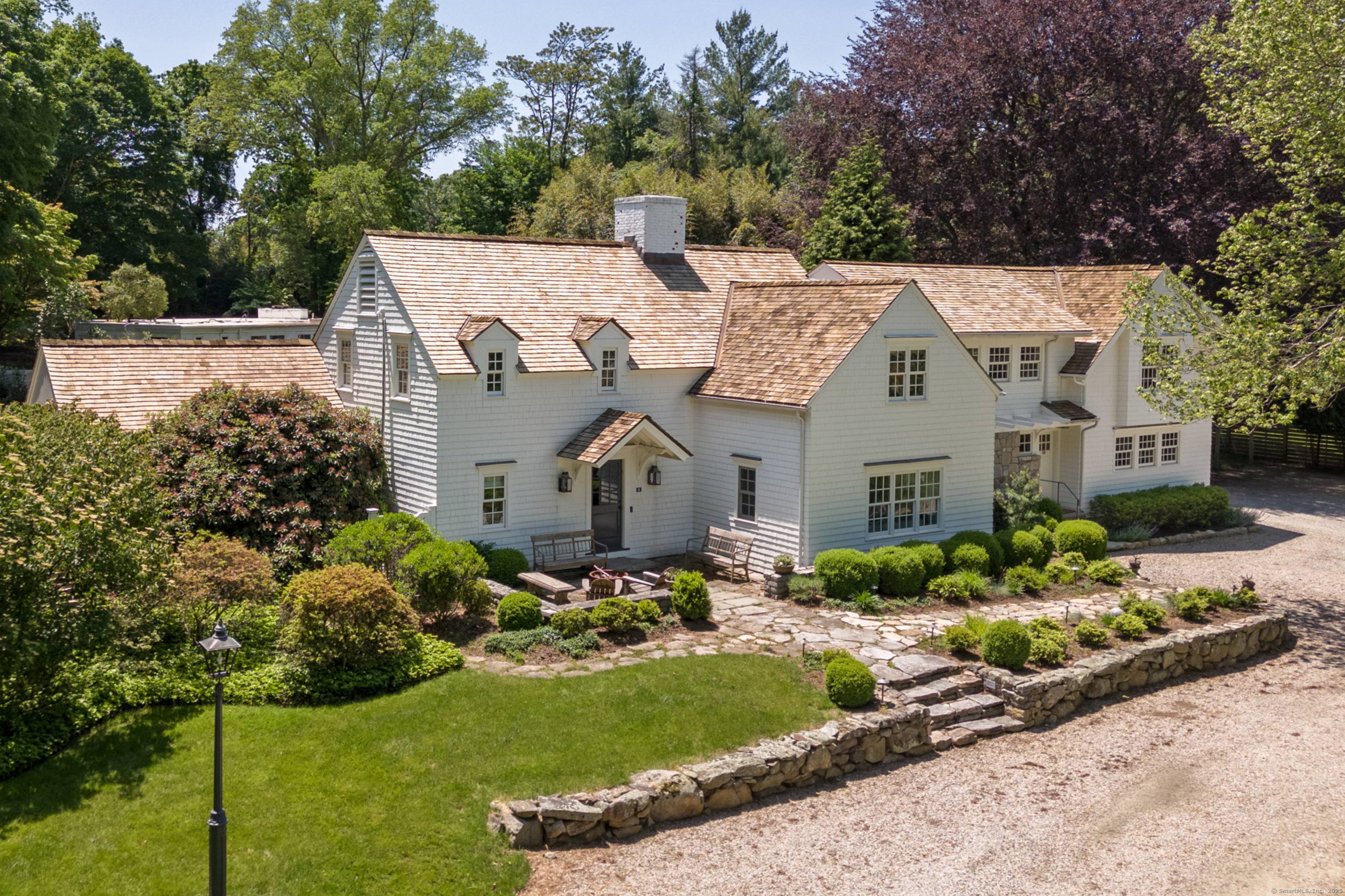 Welcome to 6 Over Rock Lane a stunning 1920s colonial retreat in the heart of Westport, Connecticut blending timeless New England charm with sophisticated modern living.