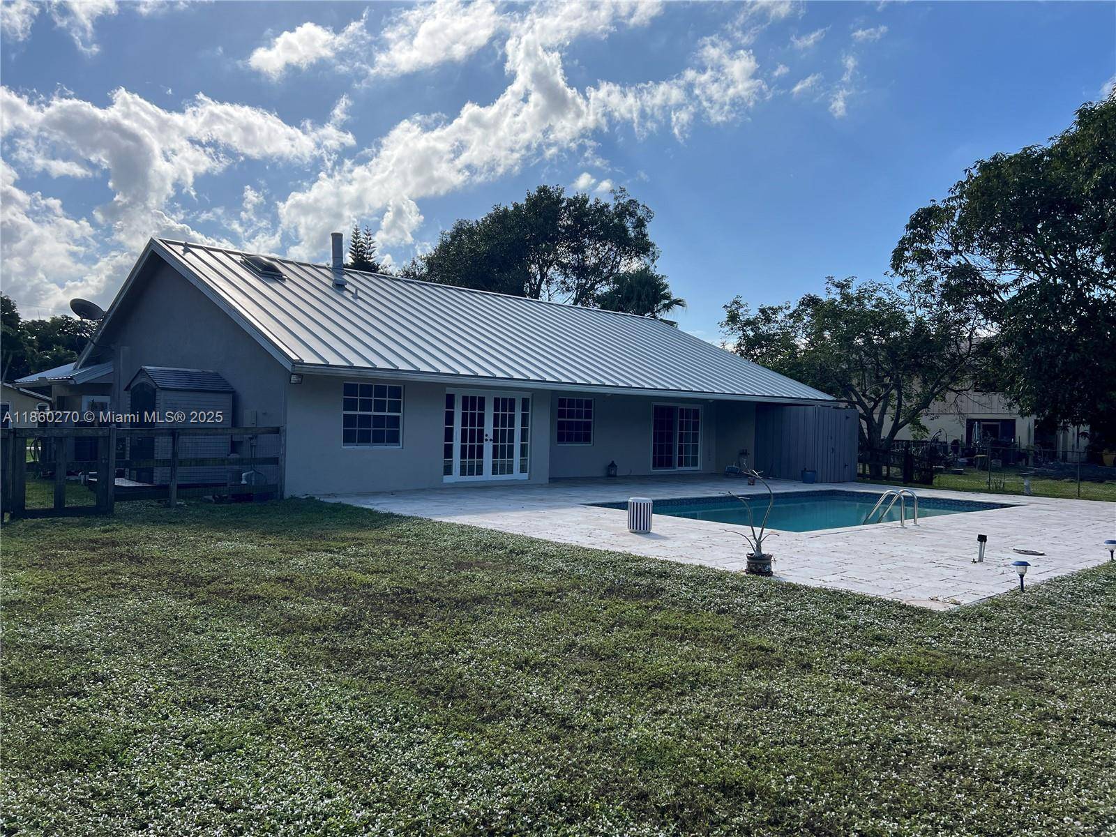 Rustic modern farmhouse on nearly an acre, perfect for city slickers seeking a country vibe with quick access to restaurants, malls, and entertainment Hardrock and Amerant Arena.
