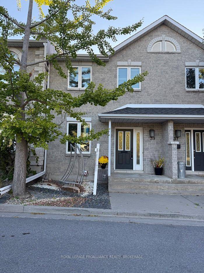 Welcome to 39 Mowat Avenue, a stone two story luxury townhome located in the heart of Kingston's historic Portsmouth Village, Just steps from Portsmouth Olympic Harbour, Lake Ontario, and the ...