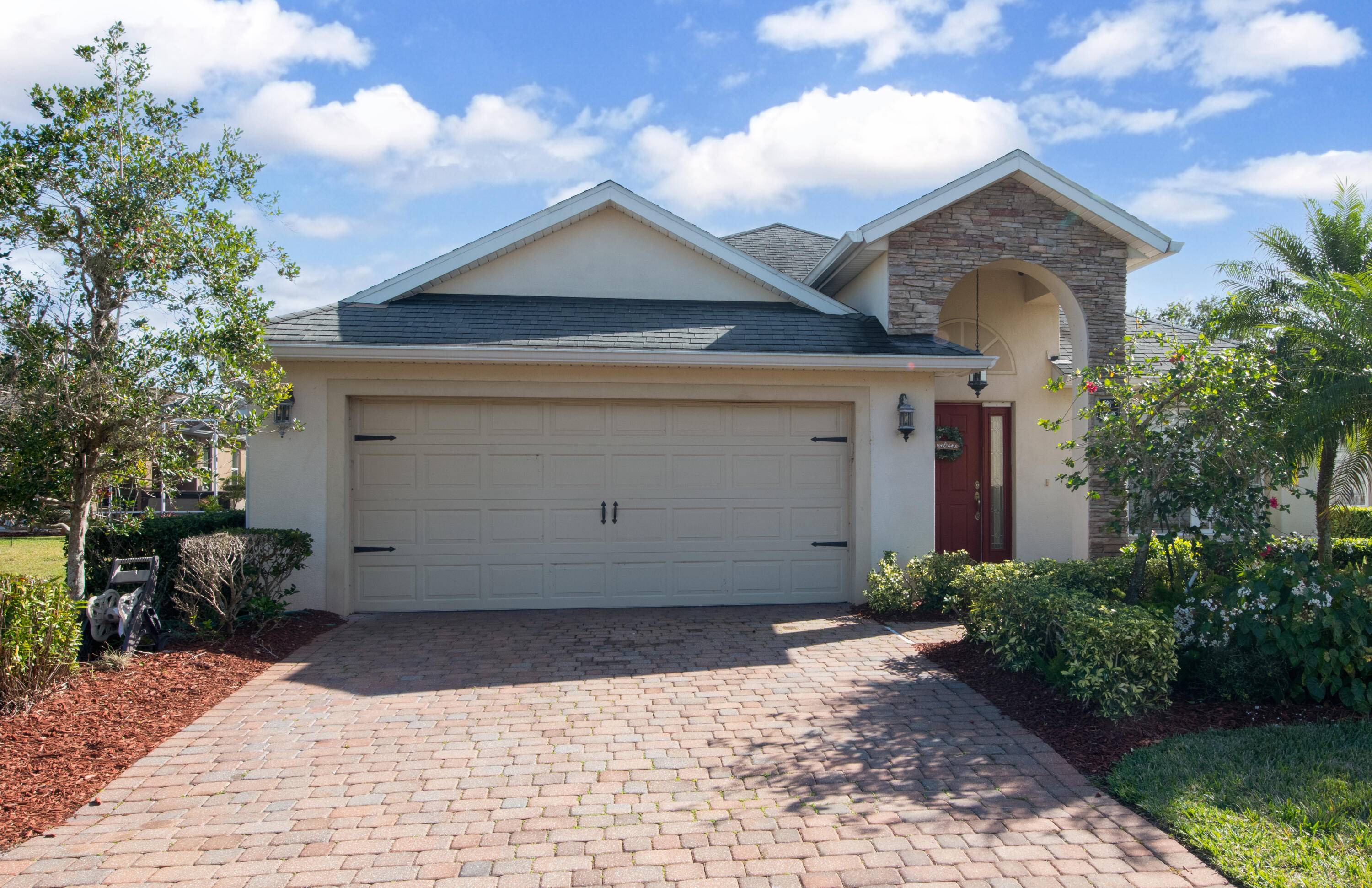 Welcome to beautiful Bayside Lakes just seconds away from I 95 offering amenities such as gated community, pool, clubhouse, gym, and plenty of sidewalks for jogging.