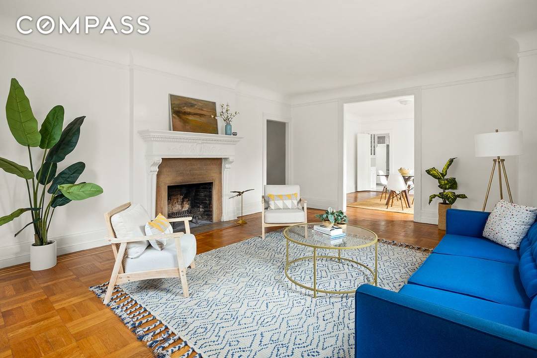 In the heart of the Jackson Heights Historic District stands one pre war residence that rises above the rest The Towers, the neighborhood s most iconic building.