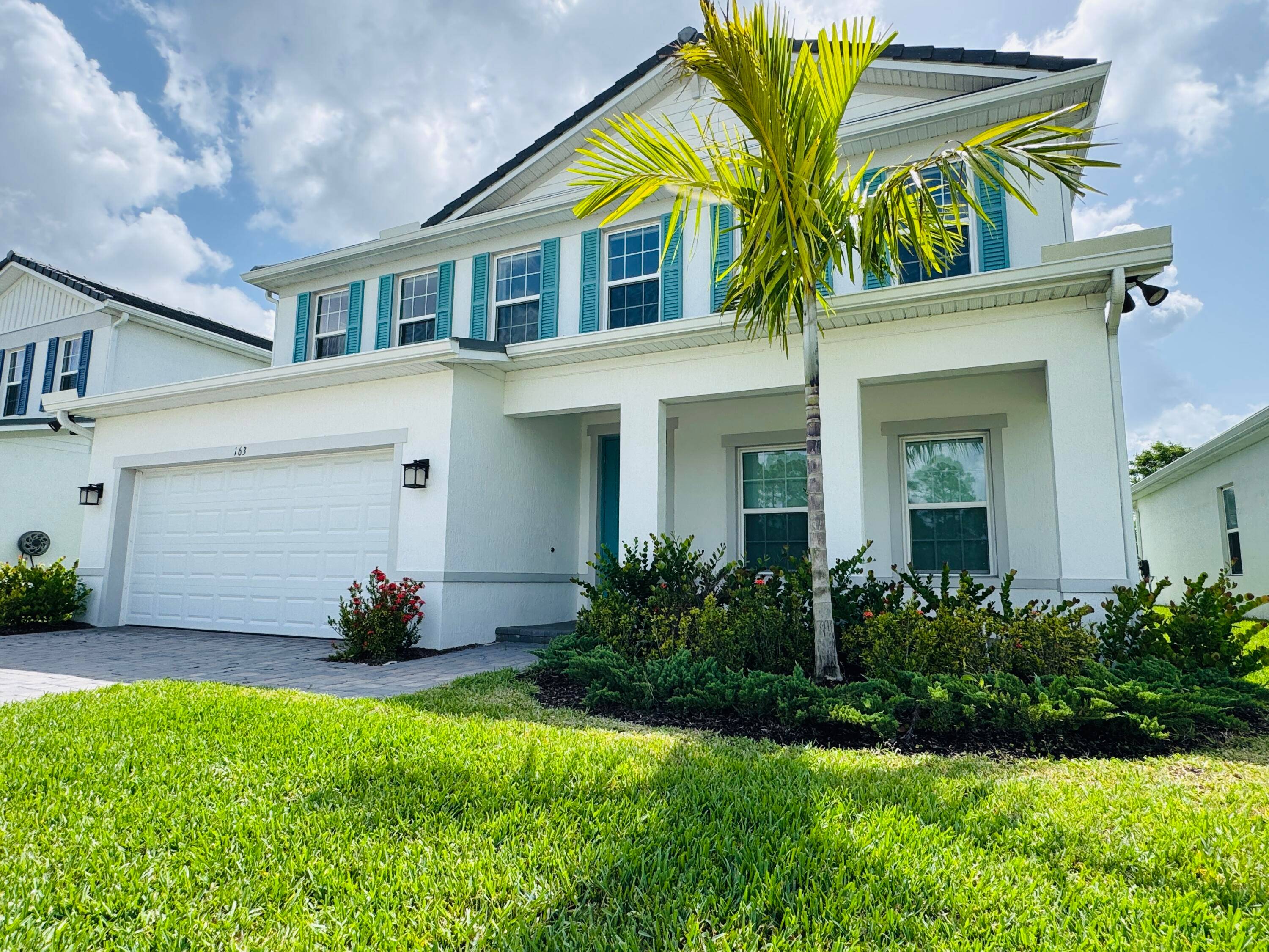 Experience Stuart, named one of the best coastal small towns, from an extremely desirable neighborhood.
