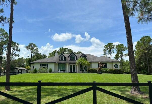 Equestrian Charm, Open Floorplan Light and Bright, Vaulted Ceilings, Formal Living Room and Dining Room, Family Room with Fireplace, Triple Sliders Open to Lanai, Spacious Kitchen Features Upgraded Cabinets, Stainless ...