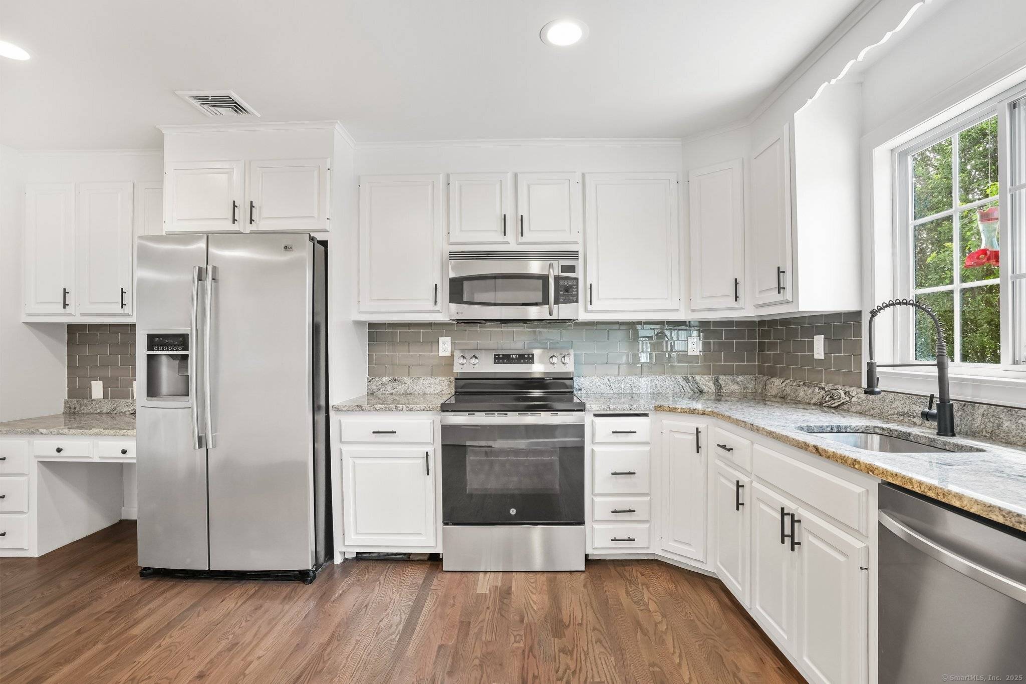 Welcome to 75 Beecher Avenue, a beautifully crafted home built in 2001, located in a peaceful Shelton neighborhood on a quiet street.