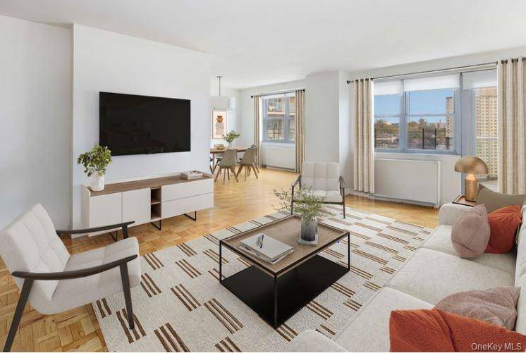 HIGH FLOOR. HIGH STYLE. Perched on a high floor with breathtaking views from every window, this beautifully renovated corner two bedroom, two bath is the epitome of luxury living.