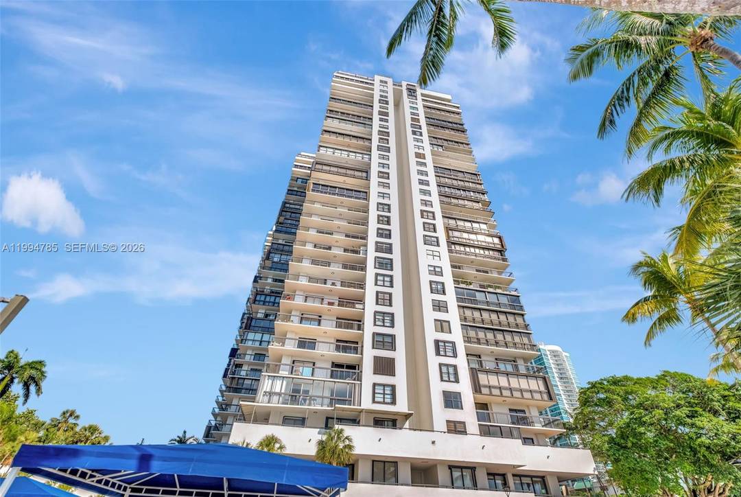 Enclosed balcony Enjoy views of the bay and tennis courts from this beautifully remodeled condo featuring an enclosed wrap around balcony for added living space 1760 sq ft with room ...