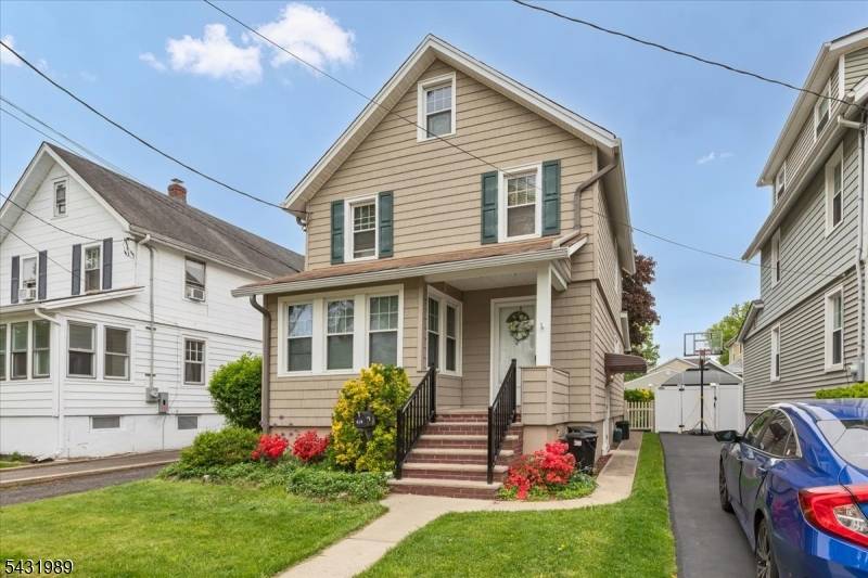 Charming, well maintained two family home located close to shopping, dining, parks and NJ transit.