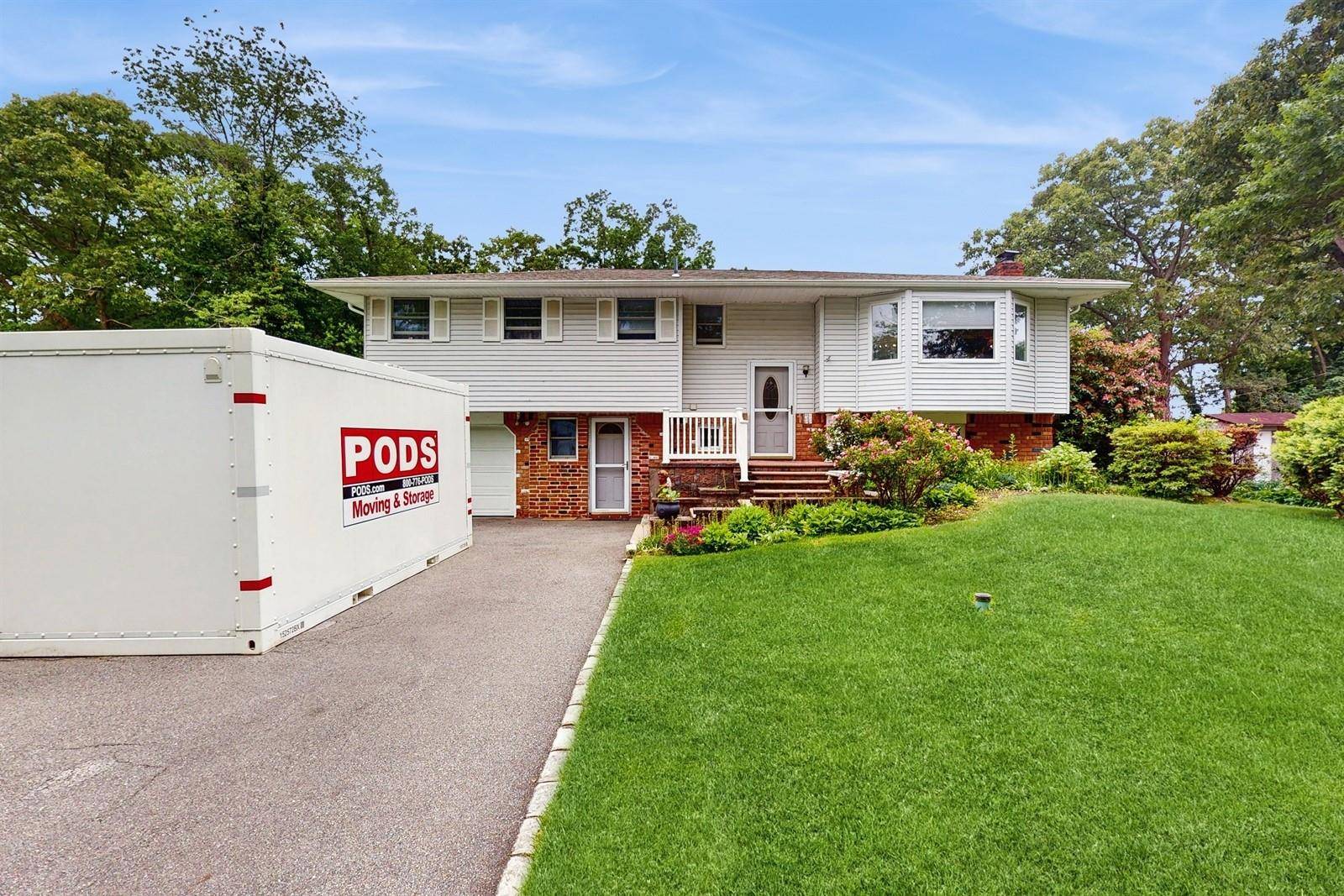 Updated Hi Ranch on. 34 Acres in Harborfields, with legal accessory apartment, and low taxes !