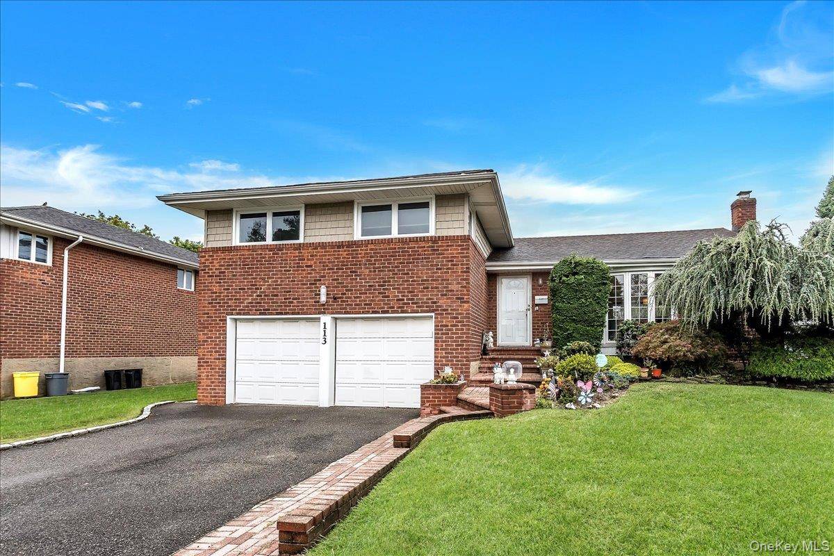 This large Split in perfect mid block location features newer updated kitchen with Grante counters and Large Island.