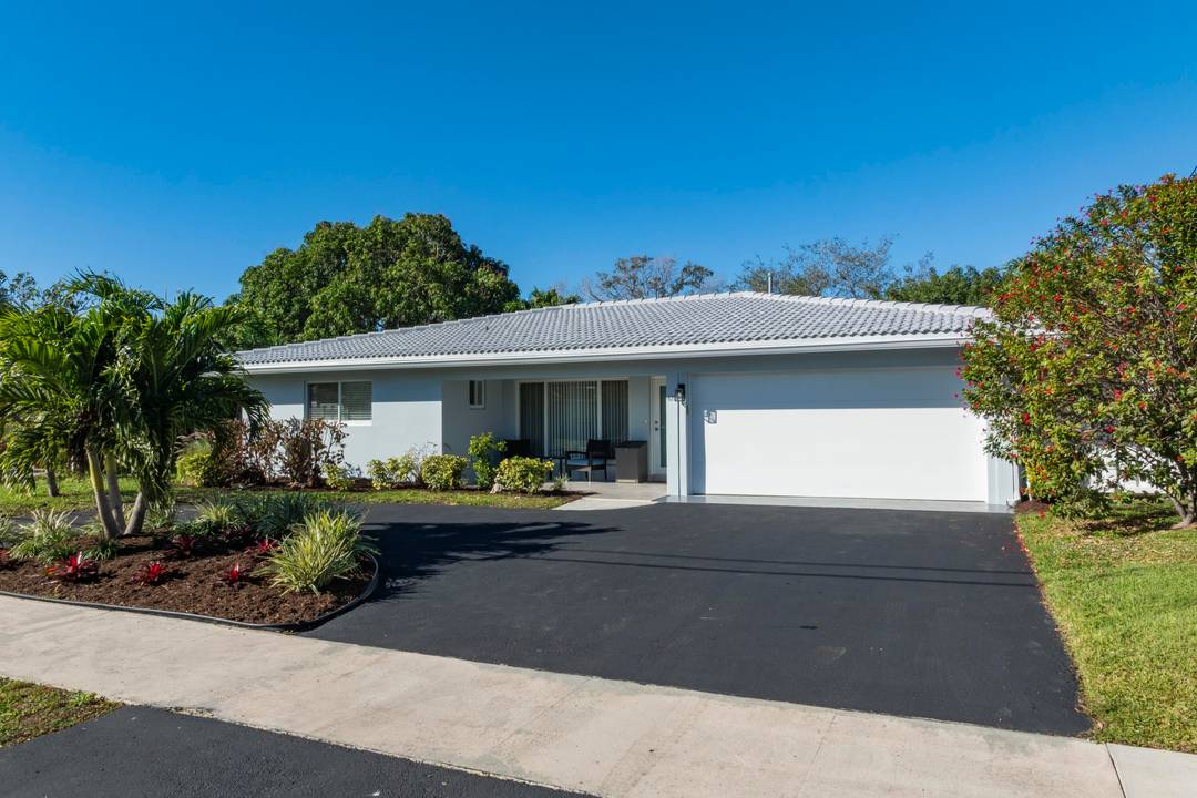 Experience coastal luxury with this immaculate waterfront home.