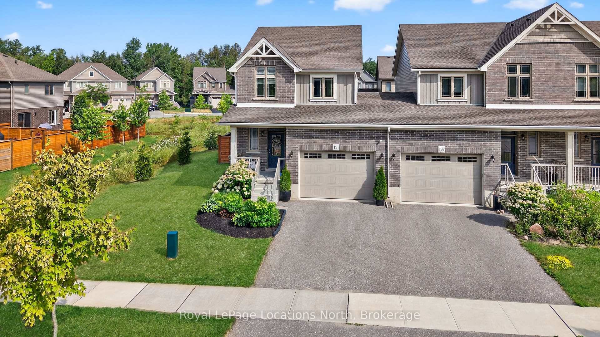 Welcome to 191 Collins Street, a stunning freehold end unit townhome in the coveted Lockhaven neighbourhood that truly lives like a detached home.