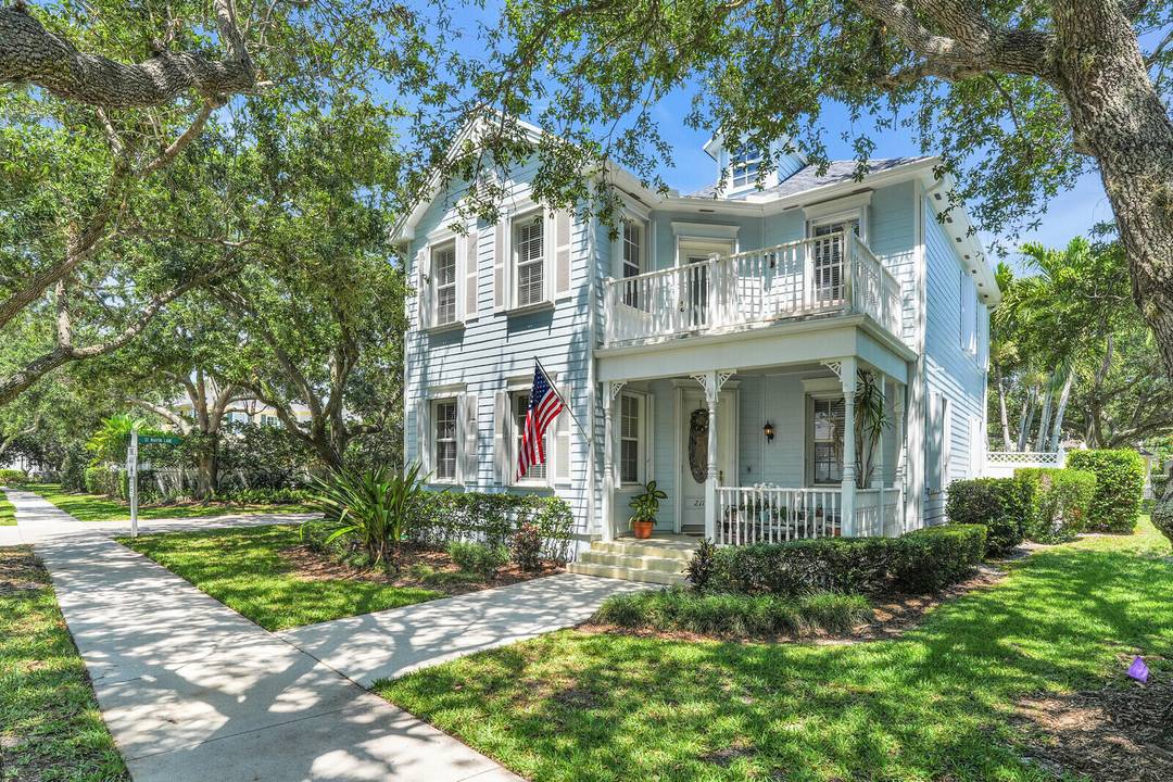 Welcome to 211 Barbados Drive, Jupiter, FL a rare corner lot gem located in the highly sought after community of the Island at Abacoa.