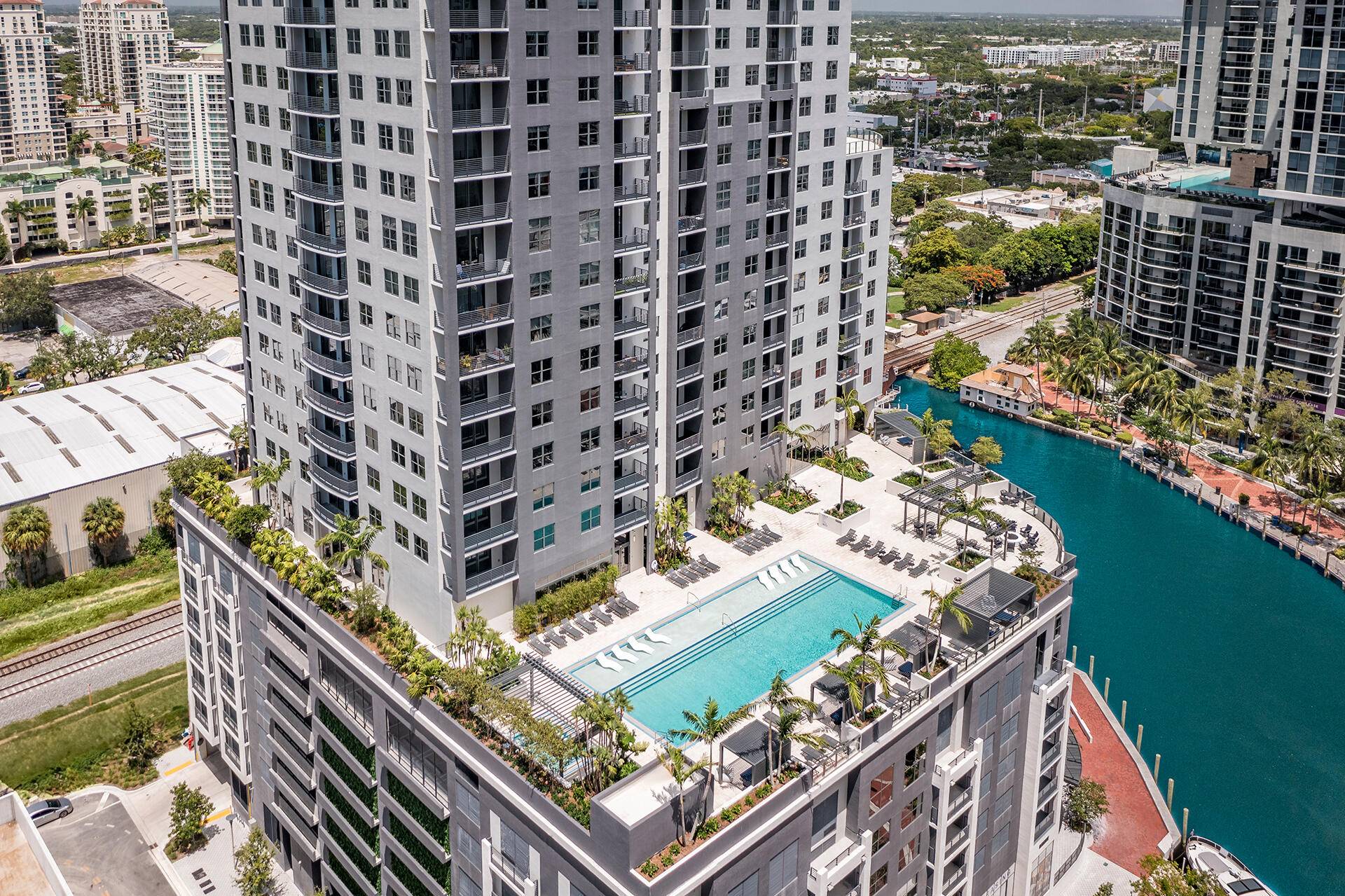 Rising above Fort Lauderdale's iconic waterfront, Harbour at New River offers panoramic water views, carefully curated interiors, and all the amenities you can imagine.