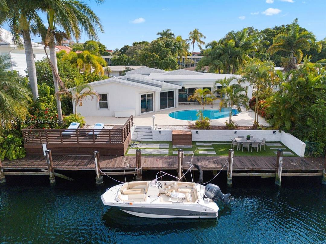Boaters Dream ! 3BR 3BA waterfront 2046 sqft home in Lighthouse Point offering 80' of deep water dockage and direct ocean access with no fixed bridges, just two blocks from ...