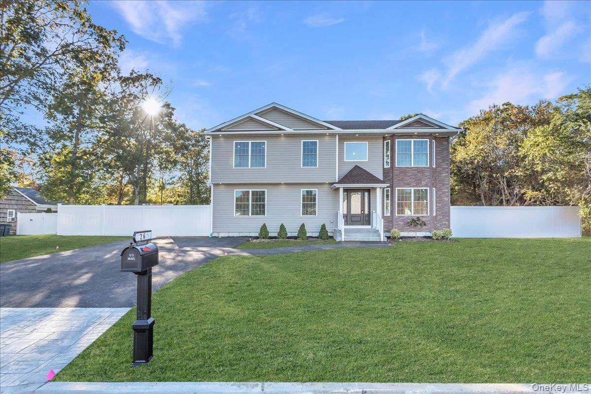 Welcome to this spacious and beautifully maintained six bedroom, three full bath high ranch, offering an abundance of living space and versatility for any lifestyle.