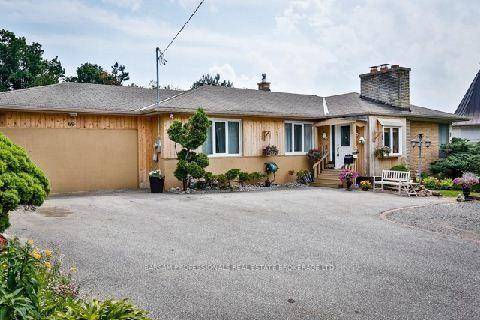 Discover this stunning 4 bedroom bungalow nestled on a premium lot measuring 151.