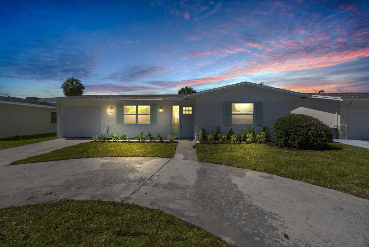 NEW EVERYTHING ! Welcome to your dream home in the heart of desirable Palm Beach Gardens, FL !