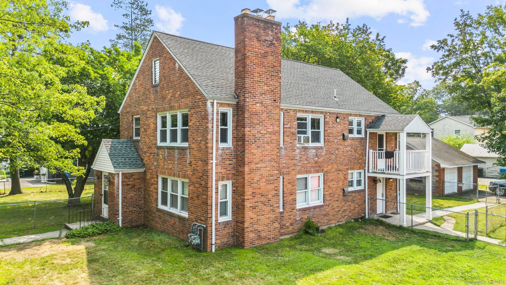 Rare brick 2 family with large yard, detached garage in prime Little Poland location !