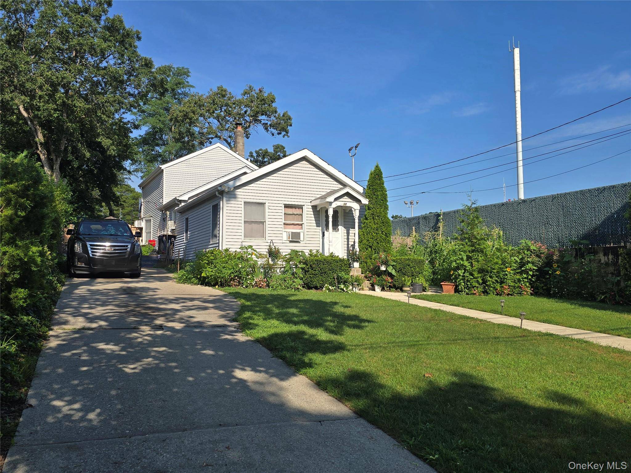 Welcome to this Charming Expanded Ranch !