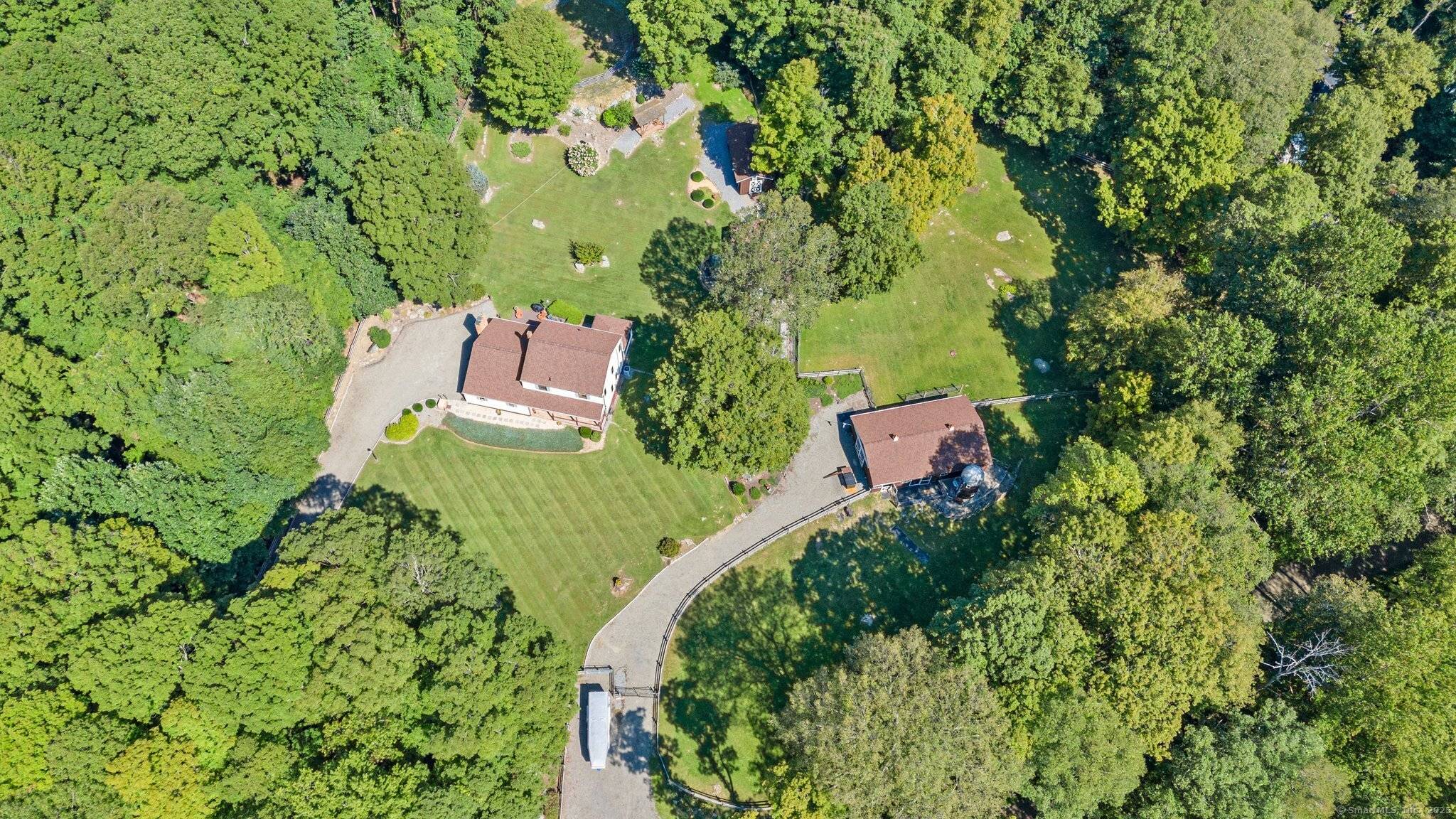 This beautifully maintained four bedroom, two bath Colonial home is a rare find a true turnkey equestrian retreat that seamlessly blends classic architectural charm with high end modern updates.