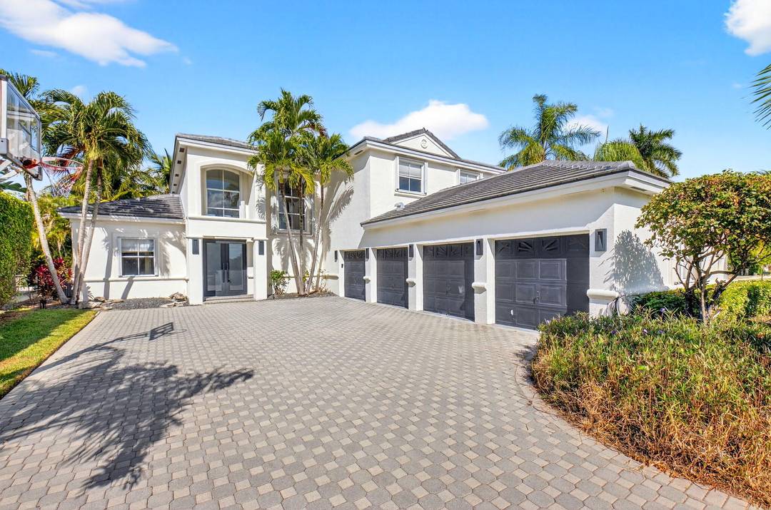 Welcome to one of the most desirable homes in The Shores set on one of the community's largest and most private lots in this 24 hour manned gated community.