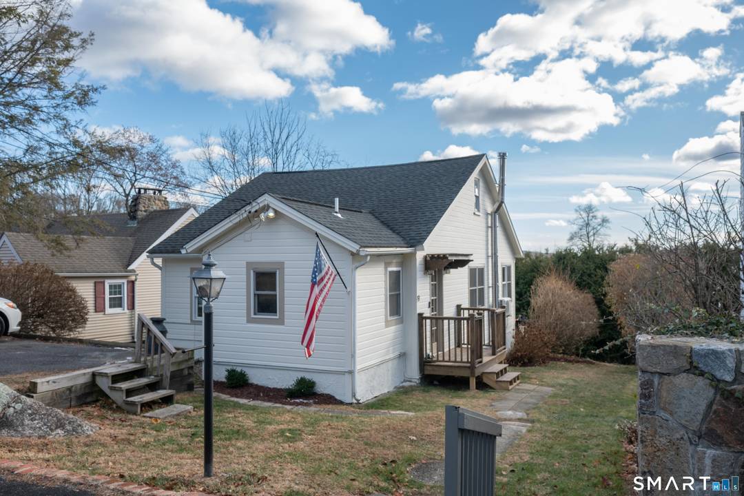 Beautifully updated and charming home in the coveted Candlewood Knolls community on Candlewood Lake.