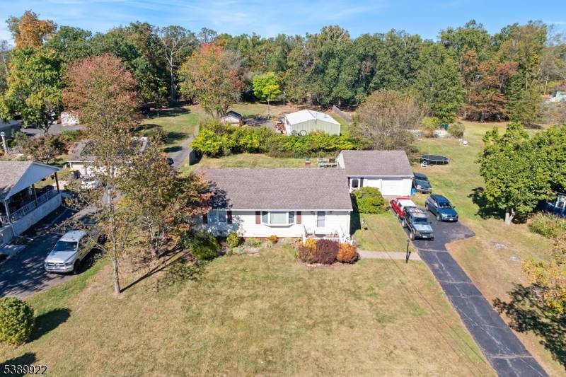 PRICED TO SELL ! Ideally located in desirable Hillsborough, don't miss this 3 bedroom, 1 bath ranch with basement and 1.