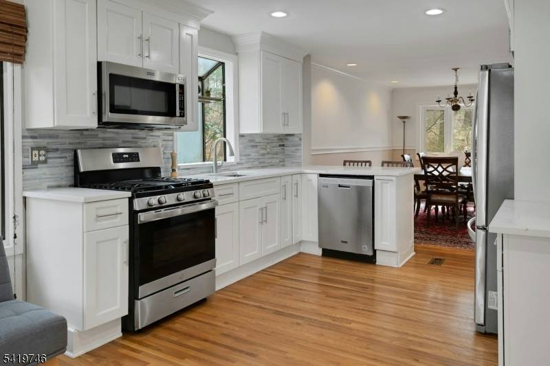 Located in a quiet wooded setting, this bright, open 3 bedroom, 2 1 2 bath end unit townhome offers all the benefits of the Mountain Lakes lifestyle without the maintenance ...