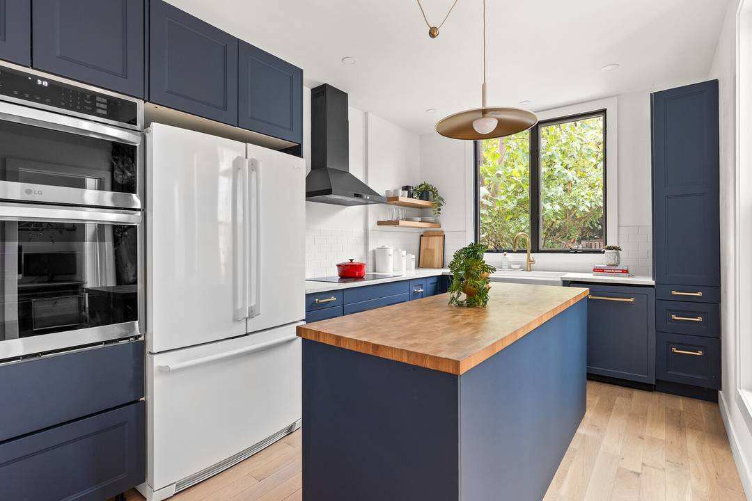 On one of Windsor Terrace's most coveted tree lined blocks, 13 Reeve Place is a 20 foot wide, three story townhouse that blends historic Brooklyn character with thoughtful modern design.