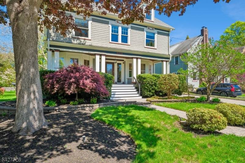 Classic Center Hall Colonial just a short distance to town and the train.