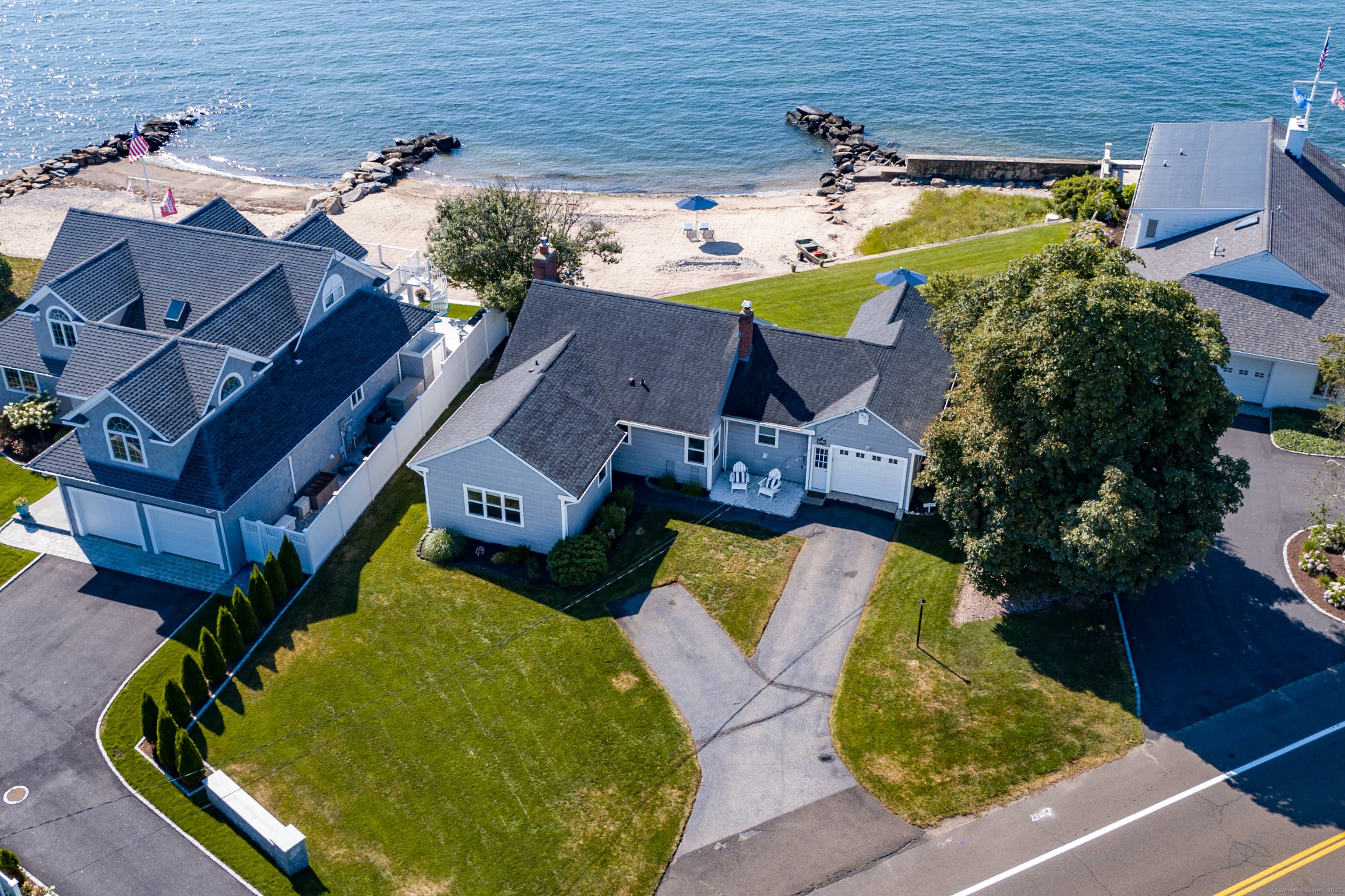 Embrace the pinnacle of coastal serenity in this captivating waterfront home, cradled by Old Saybrook's shores with a private beach, flanked by two protective break walls and a robust seawall, ...