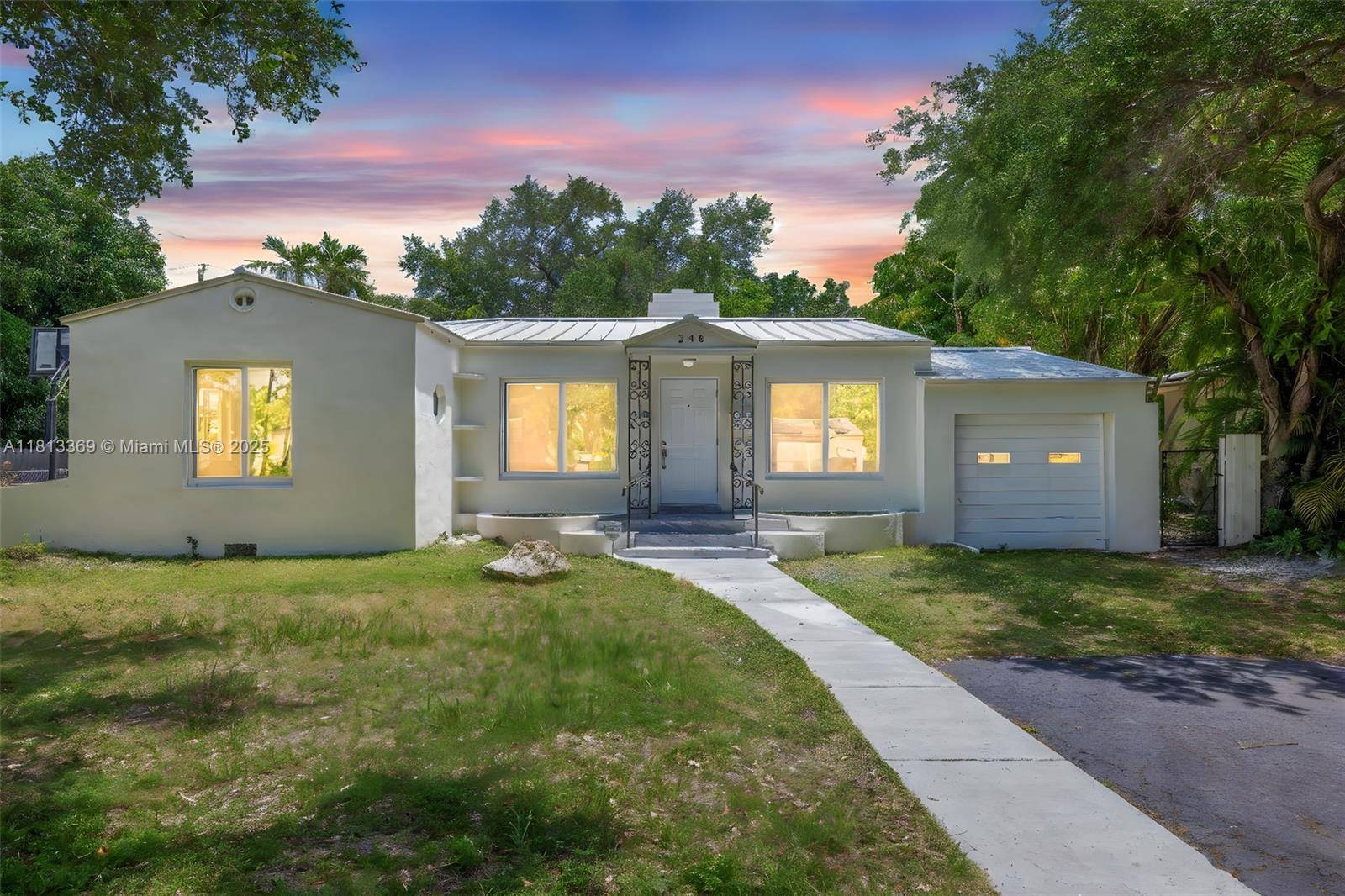 This spacious 4 bedroom, 4 bath Miami Shores home blends classic 1938 charm with modern upgrades across 2, 400 square feet of bright, open living space.
