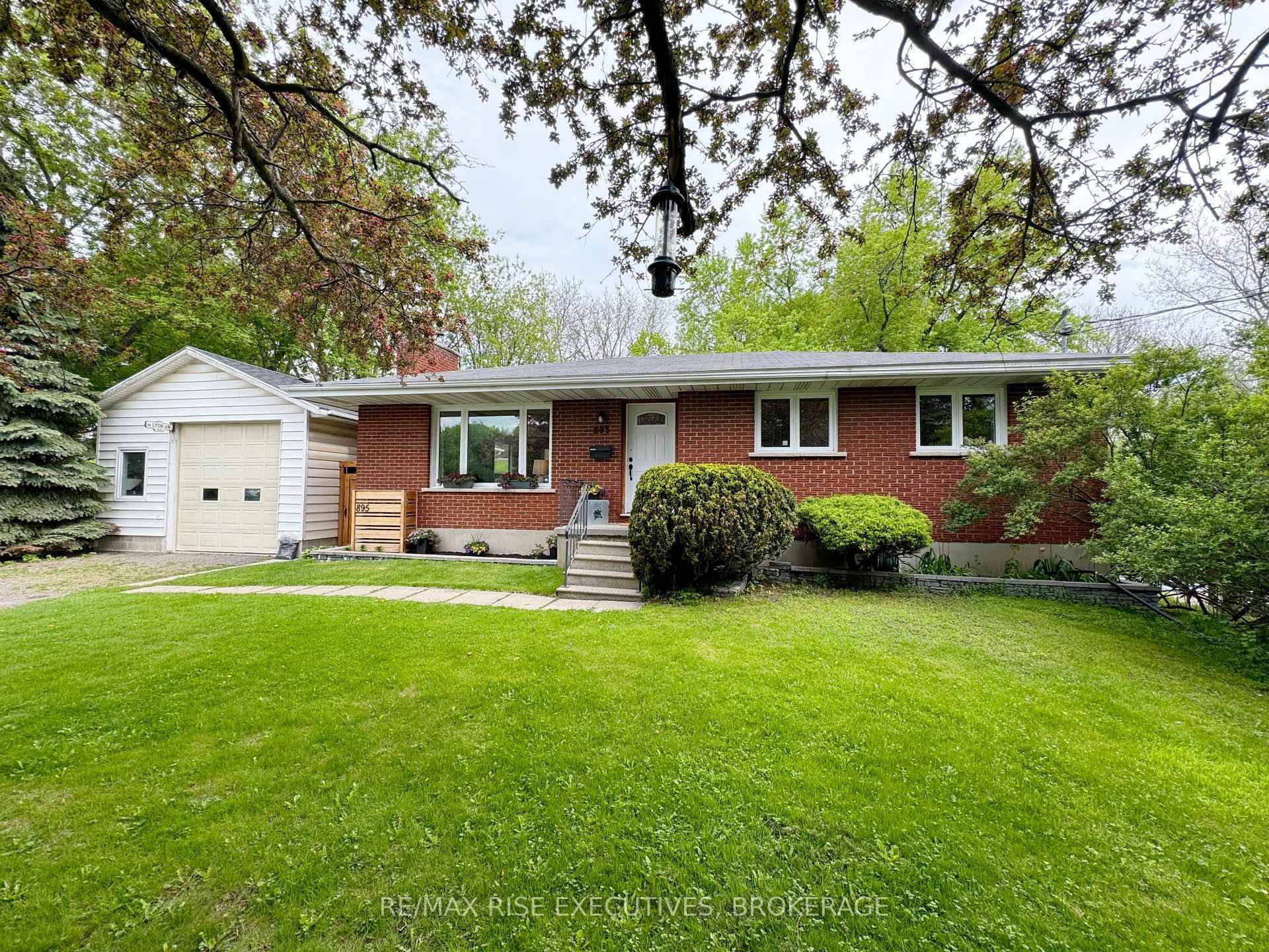 An incredible opportunity to own a beautifully updated bungalow nestled on a private half acre lot in the heart of town.